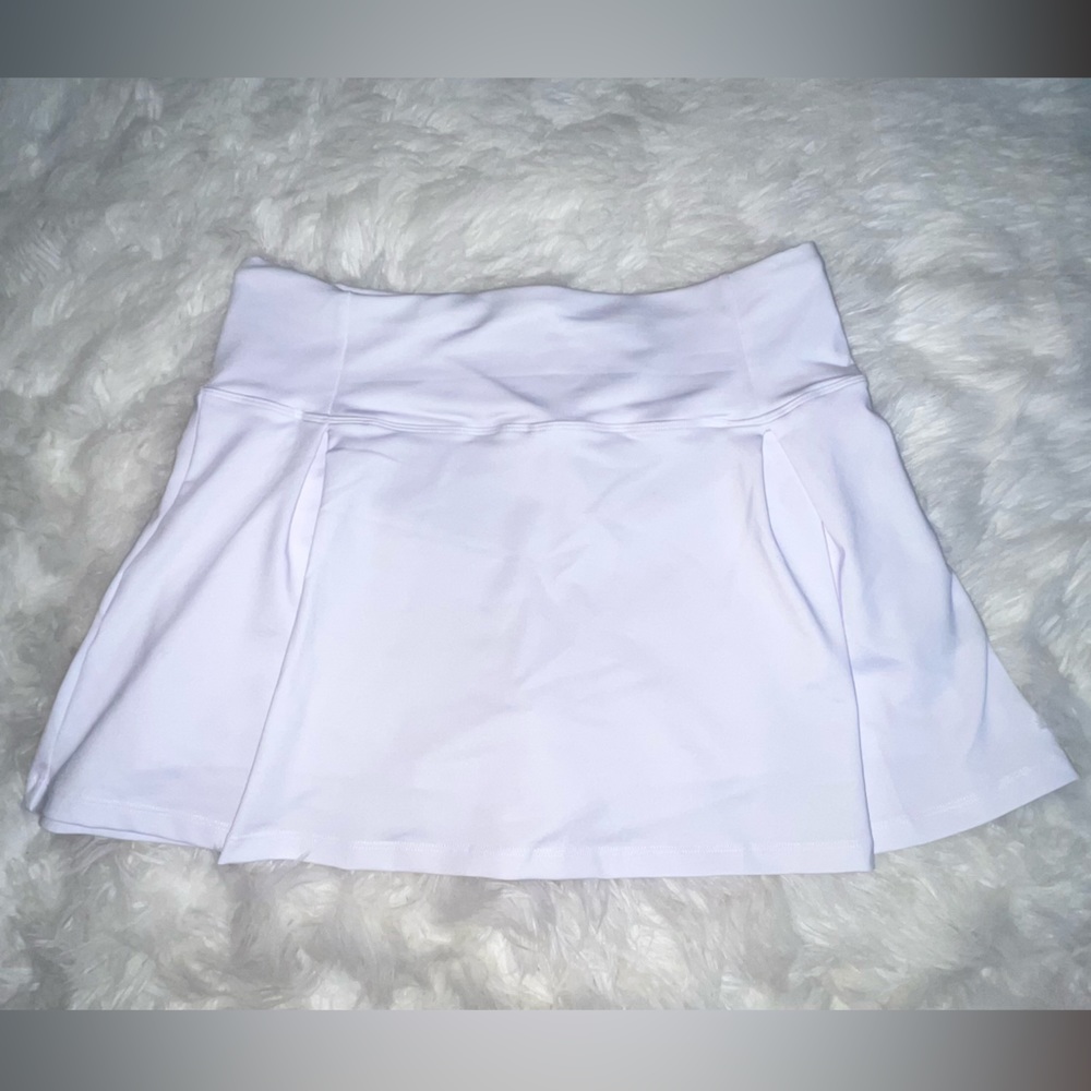 Adorable white mini tennis skort.